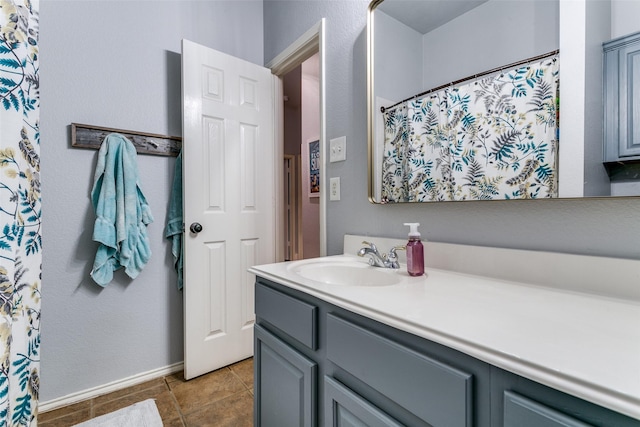 7916 Stansfield Dr, Fort Worth, TX 76137 - full bathroom featuring vanity, baseboards, and tile patterned flooring