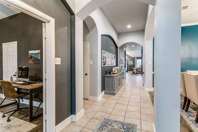 7916 Stansfield Dr, Fort Worth, TX 76137 - corridor featuring visible vents, recessed lighting, arched walkways, light tile patterned floors, and baseboards