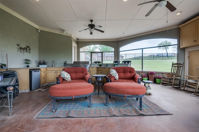 view of patio featuring area for grilling, an outdoor kitchen, ceiling fan, and a sink