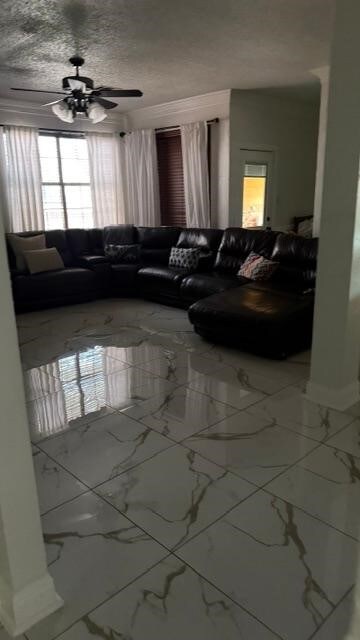 1512 Chester Dr, Plano, TX 75025 - living area featuring marble look tile flooring and baseboards