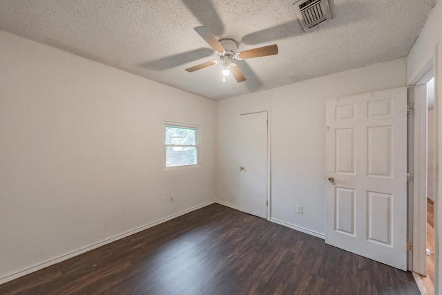 1941 Michael Ct, Pelican Bay, TX 76020 - unfurnished bedroom with a textured ceiling, visible vents, dark wood-style flooring, ceiling fan, and baseboards