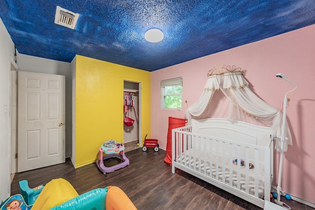 1941 Michael Ct, Pelican Bay, TX 76020 - bedroom with baseboards, a closet, visible vents, and wood finished floors