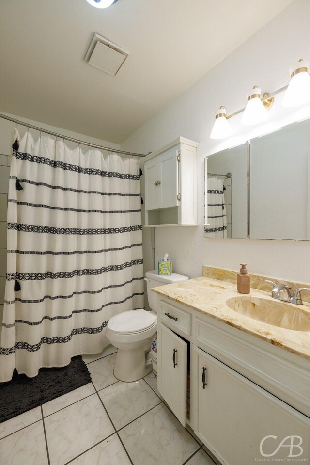 3749 Oldham Ln, Abilene, TX 79602 - full bathroom with toilet, a shower with curtain, visible vents, marble finish floor, and vanity