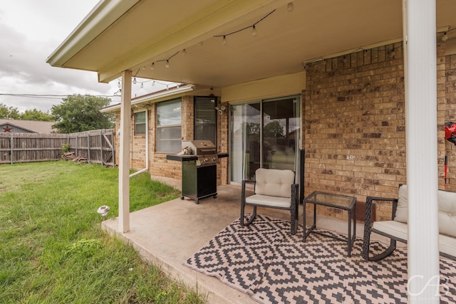 3749 Oldham Ln, Abilene, TX 79602 - view of patio with fence and a grill