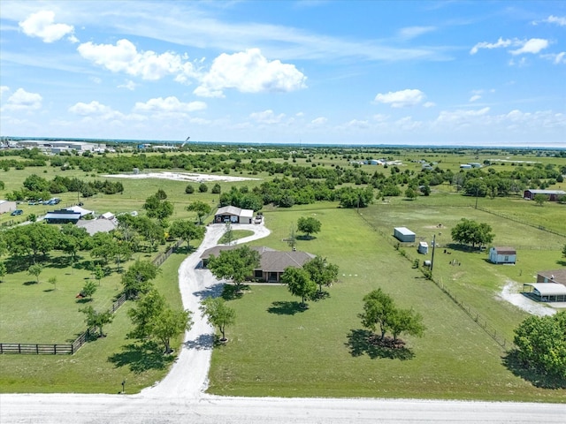 birds eye view of property with a rural view