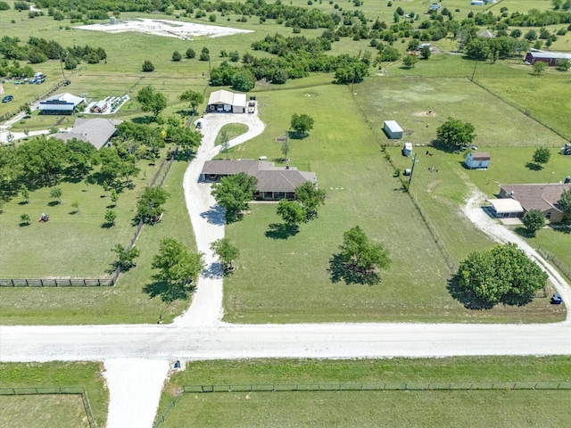 birds eye view of property featuring a rural view