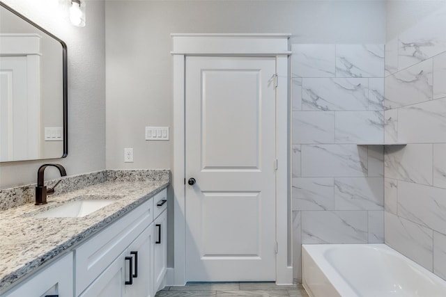 2017 Swallowtail Ct, Poolville, TX 76487 - bathroom featuring vanity, shower / bathtub combination, and marble finish floor