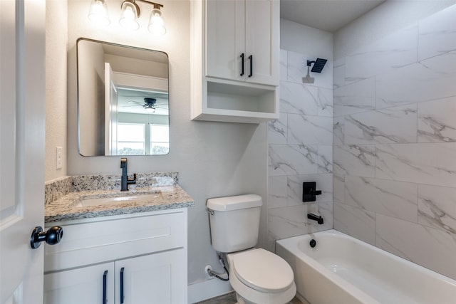 full bathroom featuring vanity, toilet, shower / tub combination, and a ceiling fan