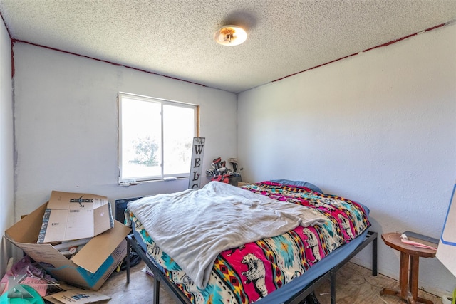 bedroom with a textured ceiling