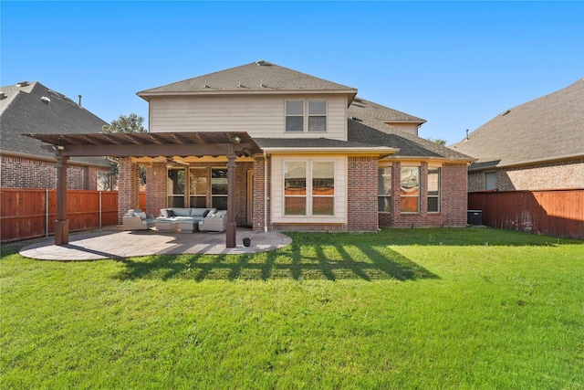 rear view of property with a pergola, a lawn, a fenced backyard, an outdoor hangout area, and a patio area