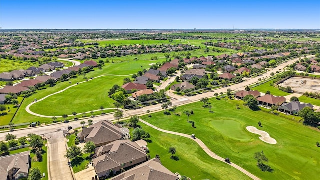 birds eye view of property featuring golf course view and a residential view
