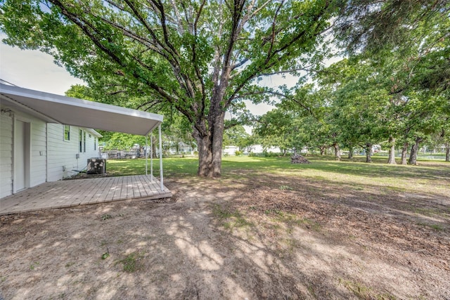 1509 Mitchell Dr, Bonham, TX 75418 - view of yard featuring a wooden deck
