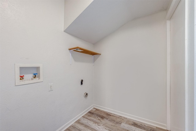 1509 Mitchell Dr, Bonham, TX 75418 - washroom featuring baseboards, hookup for a washing machine, laundry area, and light wood-style flooring