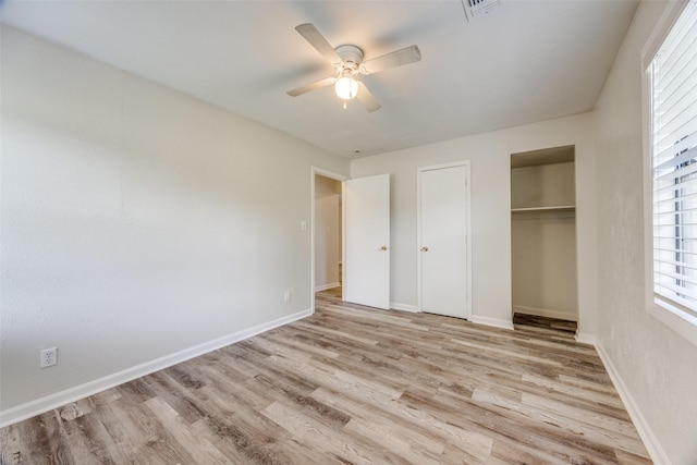 1509 Mitchell Dr, Bonham, TX 75418 - unfurnished bedroom with ceiling fan, baseboards, visible vents, and wood finished floors