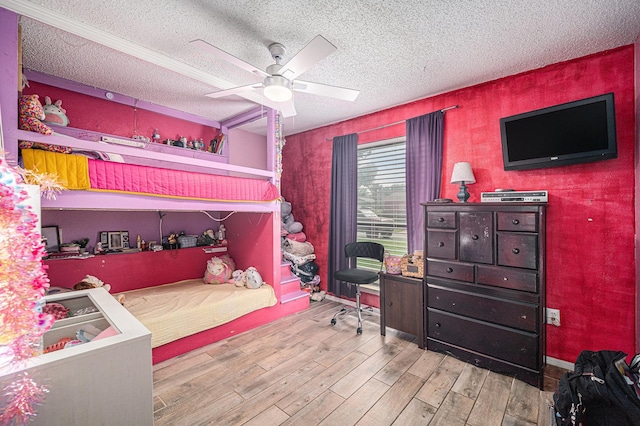3811 Pelham Mnr, Arlington, TX 76016 - bedroom with a textured ceiling, wood finished floors, and a ceiling fan
