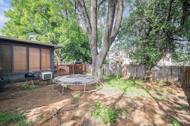 3811 Pelham Mnr, Arlington, TX 76016 - view of yard featuring a fenced backyard and a sunroom