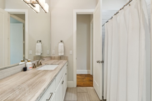 431 Blanning Dr, Dallas, TX 75218 - full bathroom with baseboards and vanity