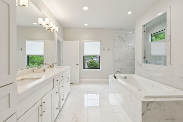 431 Blanning Dr, Dallas, TX 75218 - bathroom with a wealth of natural light, marble finish floor, and recessed lighting