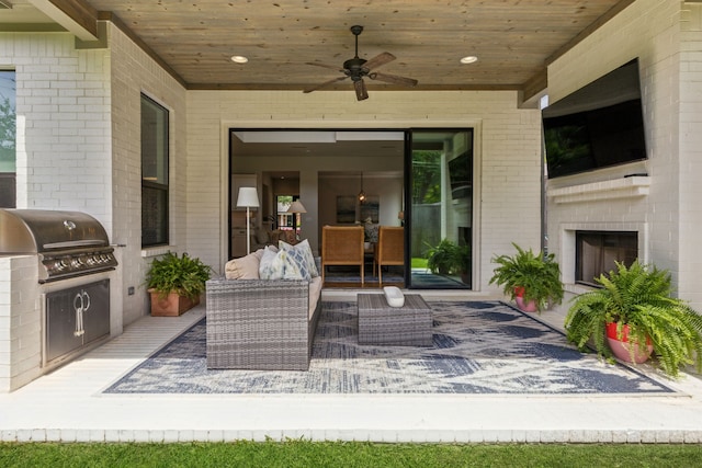 431 Blanning Dr, Dallas, TX 75218 - view of patio featuring exterior kitchen, an outdoor living space with a fireplace, a grill, and a ceiling fan