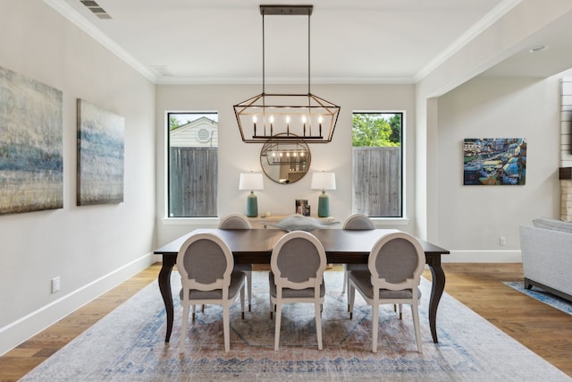 431 Blanning Dr, Dallas, TX 75218 - dining area featuring plenty of natural light, visible vents, and wood finished floors