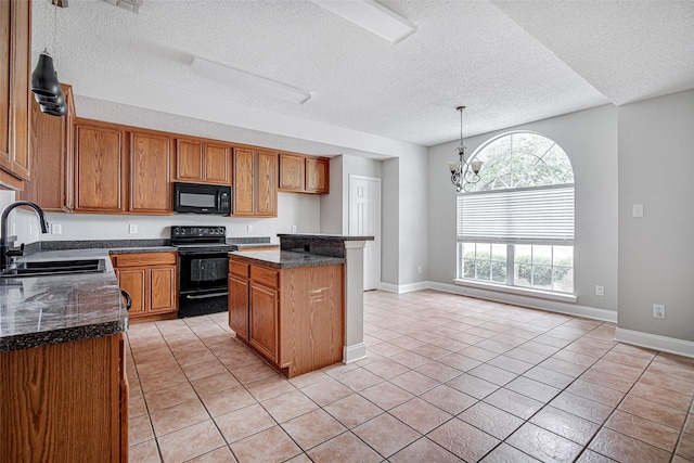 1001 Benjamin Dr, Burleson, TX 76028 - kitchen with a textured ceiling, black appliances, a notable chandelier, and a sink