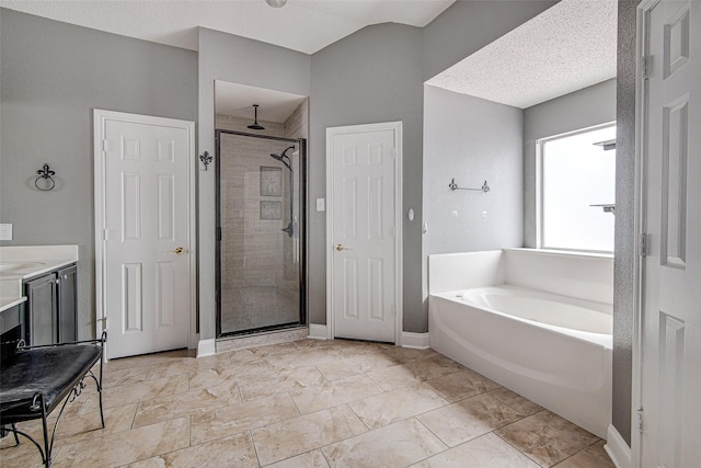 1001 Benjamin Dr, Burleson, TX 76028 - bathroom with a shower stall, baseboards, and a bath