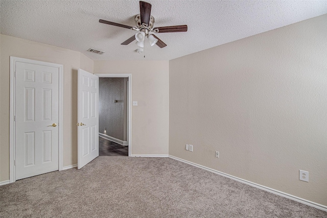 1001 Benjamin Dr, Burleson, TX 76028 - unfurnished bedroom featuring carpet, a textured ceiling, visible vents, and baseboards