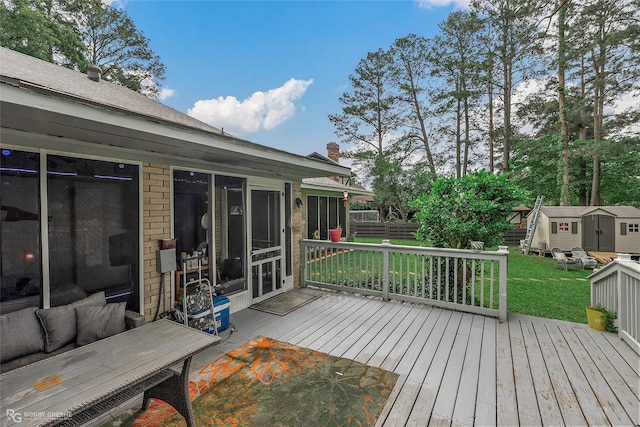 103 Maple Leaf Ln, Haughton, LA 71037 - wooden terrace featuring an outdoor structure, a storage unit, a yard, a sunroom, and outdoor lounge area