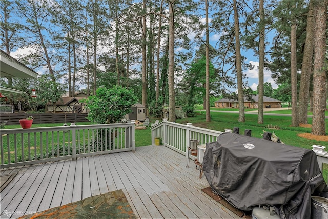 103 Maple Leaf Ln, Haughton, LA 71037 - deck with a yard, an outdoor structure, grilling area, and a storage unit