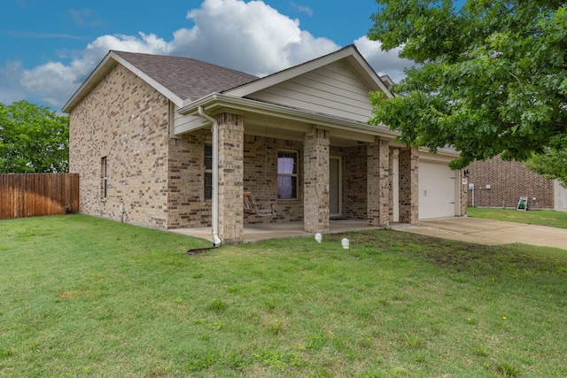 ranch-style house featuring driveway, brick siding, fence, an attached garage, and a front yard