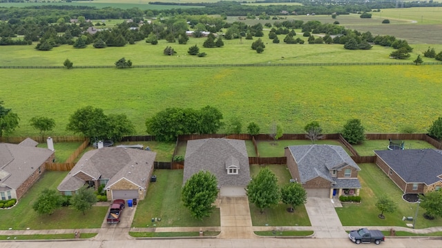 drone / aerial view with a rural view and a residential view
