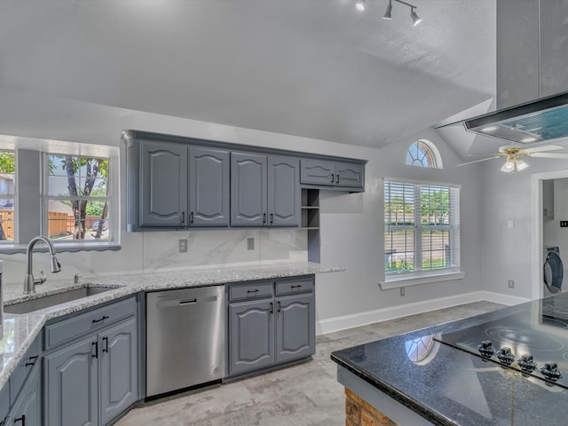 kitchen featuring dishwasher, a sink, lofted ceiling, a ceiling fan, and gray cabinets