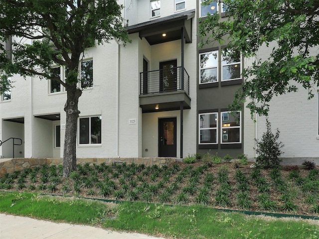 3356 Norris St, Plano, TX 75074 - view of front of home featuring a balcony and brick siding
