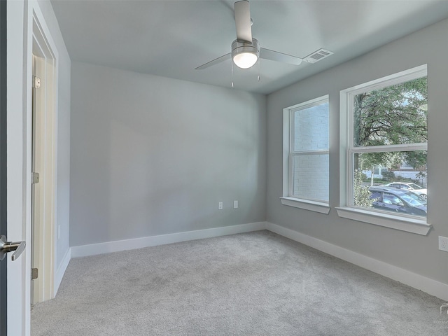 3356 Norris St, Plano, TX 75074 - empty room featuring carpet flooring, plenty of natural light, and a ceiling fan