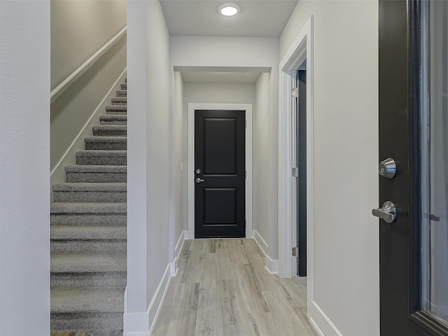 3356 Norris St, Plano, TX 75074 - corridor featuring stairway, light wood-style flooring, and baseboards