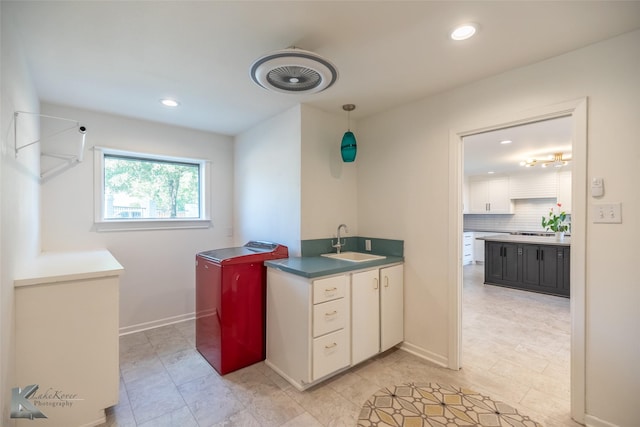 718 Byrd Dr, Abilene, TX 79601 - laundry room featuring recessed lighting, baseboards, and light tile patterned flooring