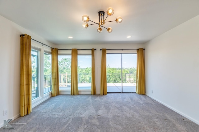 718 Byrd Dr, Abilene, TX 79601 - carpeted empty room featuring healthy amount of natural light, a chandelier, baseboards, and recessed lighting