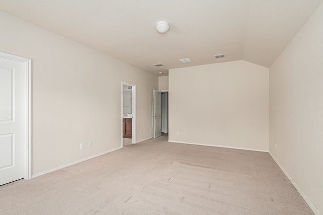 732 Harrison Ln, Lavon, TX 75166 - empty room featuring lofted ceiling, light carpet, visible vents, and baseboards
