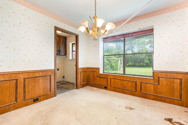 107 Russell Dr, Highland Village, TX 75077 - empty room with a wainscoted wall, a chandelier, carpet flooring, wallpapered walls, and wooden walls