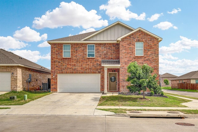1600 Shadow Hawk Dr, Fort Worth, TX 76052 - traditional home featuring board and batten siding, central air condition unit, driveway, a garage, and brick siding