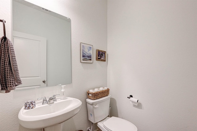 1600 Shadow Hawk Dr, Fort Worth, TX 76052 - half bathroom with toilet and a sink