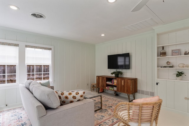 5107 Milam St, Dallas, TX 75206 - living area featuring crown molding, visible vents, a decorative wall, and recessed lighting