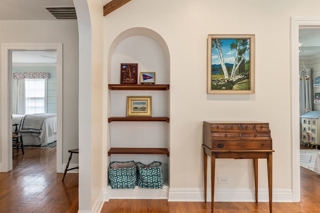5107 Milam St, Dallas, TX 75206 - hall featuring baseboards, visible vents, and wood finished floors