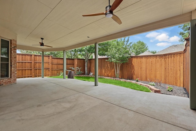 411 Deer Brooke Dr, Allen, TX 75002 - fenced backyard with ceiling fan and a patio