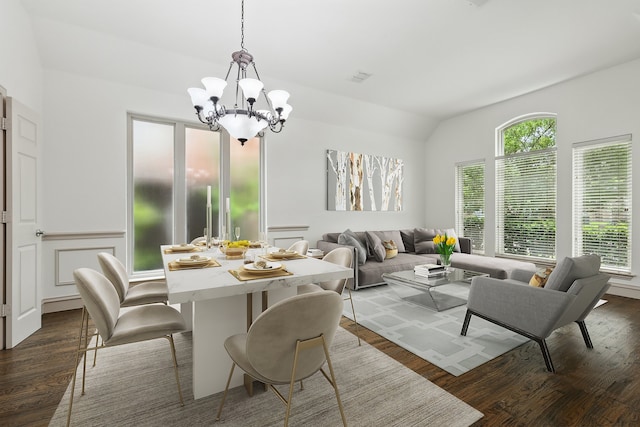 411 Deer Brooke Dr, Allen, TX 75002 - dining area featuring dark wood-style flooring, a chandelier, and lofted ceiling