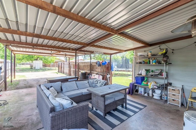 1773 Westview Dr, Abilene, TX 79603 - fenced backyard featuring a trampoline, outdoor lounge area, and a patio area