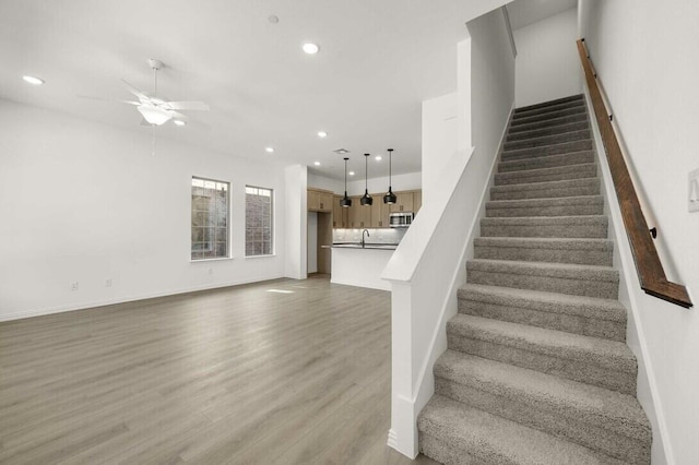 2418 Bulin, Mansfield, TX 76063 - stairway featuring a ceiling fan, baseboards, recessed lighting, and wood finished floors