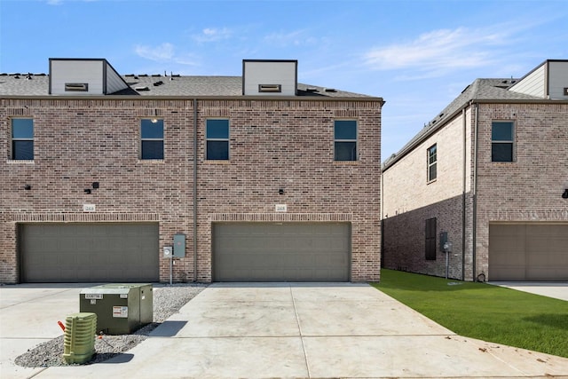 2418 Bulin, Mansfield, TX 76063 - exterior space featuring an attached garage, concrete driveway, and brick siding