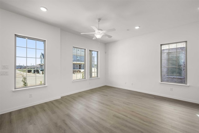 2418 Bulin, Mansfield, TX 76063 - empty room with a ceiling fan, baseboards, recessed lighting, and wood finished floors