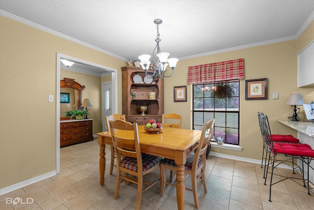 dining area with baseboards, ornamental molding, an inviting chandelier, and a textured ceiling